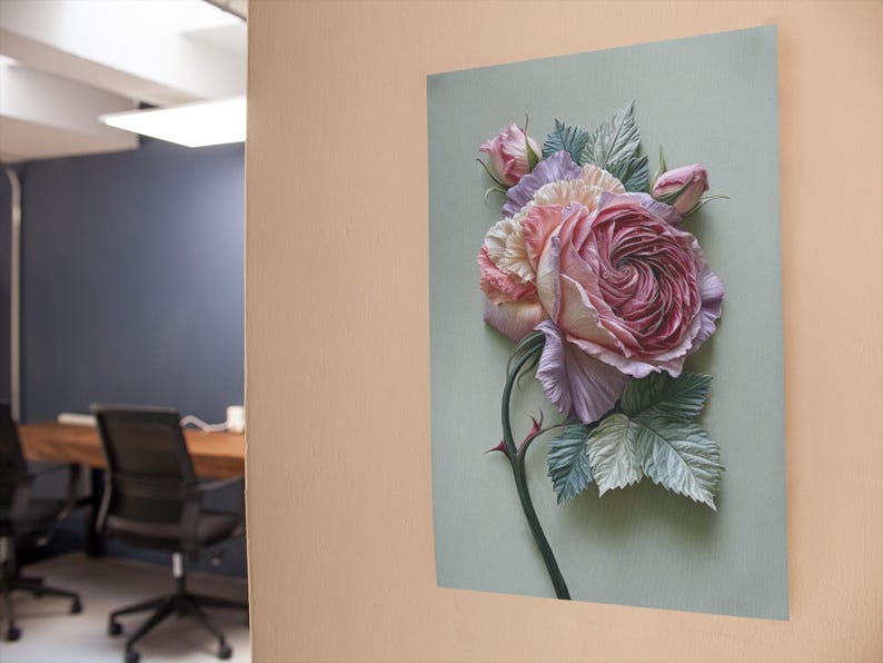 May include: A framed floral art print featuring a large, detailed rose in shades of pink, lavender, and cream. The rose is the focal point, with green leaves and a thorny stem against a pale green background. The artwork is mounted on a wall.