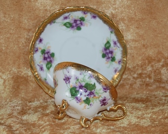 Vintage Nikoniko EW Imported Japan Tri Foot Teacup & Saucer