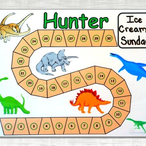 May include: A colorful game board with a dinosaur theme. The board has a path with numbers 1 through 30. The board also has pictures of dinosaurs and the words "Hunter" and "Ice Cream Sundae".