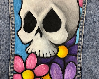 Custom hand-painted girl’s denim jacket size M. (Old Navy) Features a super cute skull and flowers theme. Only one available!