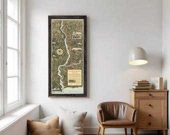 May include: A vertical framed map of the Lewis and Clark Expedition, featuring a detailed topographical illustration of the river route, historical text, and small inset images, all enclosed in a dark, textured wooden frame.
