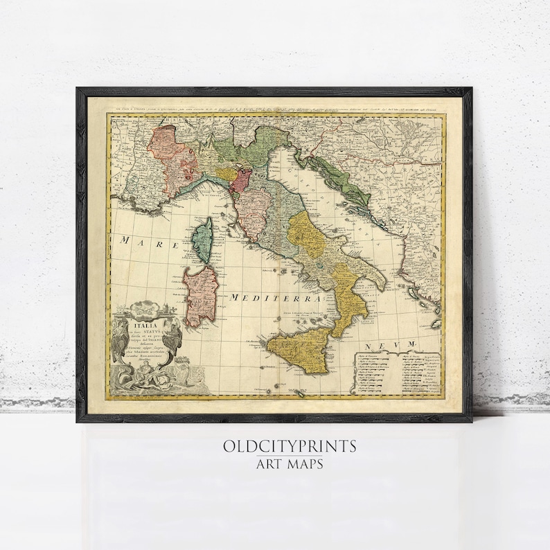The image is a framed vintage map of Italy, showing the country's geographical layout and surrounding areas.