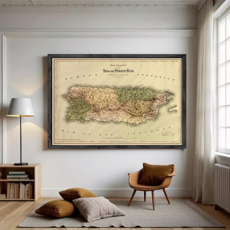 The image is a framed vintage map of Puerto Rico, depicting the island's geographical layout and surrounding areas.