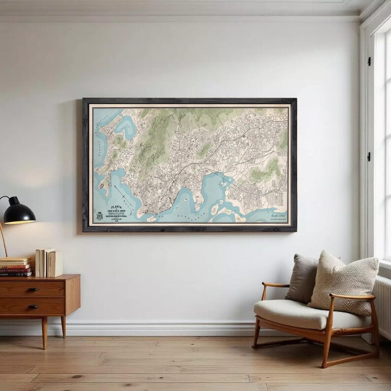 The image is a framed map of a city, likely depicting a coastal area, with various landmarks and geographical features.