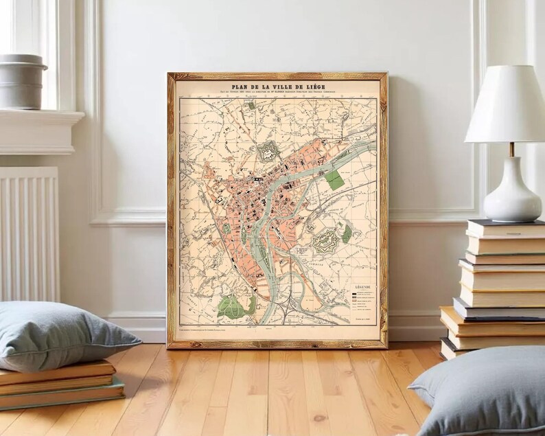 The image is a framed vintage map of a city, likely Paris, with various landmarks and streets depicted.