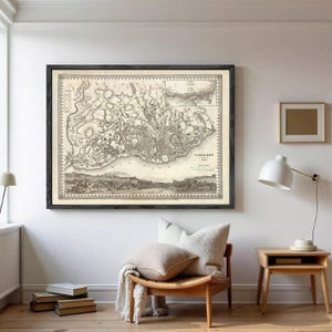 The image is a framed antique map of London, England, dating back to the 18th century.