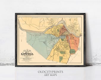 May include: Framed vintage map of Lowell, Massachusetts, from 1881, with a black frame. The map features a detailed layout of the city with color-coded areas and the text "OLD CITY PRINTS ART MAPS" at the bottom.