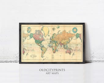 May include: An antique world map print in a black frame. The map features a vintage design with various colors highlighting different regions. The text "THE WORLD" is visible. The bottom of the frame has the text "OLDCITYPRINTS ART MAPS".