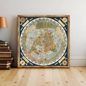 May include: A square framed wall art piece featuring a circular, vintage-style map of the world. The map displays continents in muted green and tan tones against a blue ocean background, enclosed by a decorative border with circular diagrams.