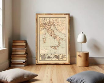 May include: A framed vintage-style tourist map of Italy with a beige background, black text, and red route lines. The map features detailed cartography of the Italian peninsula, islands, and smaller inset maps at the bottom, all enclosed in a wooden frame.