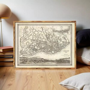 The image is a framed antique map of London, England, dating back to 1858.