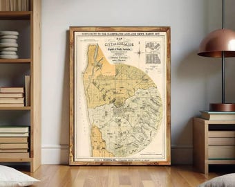 May include: A framed vintage map titled Supplement to the Illustrated Adelaide News March 1877, depicting the City of Adelaide, Capital of South Australia, with detailed grid lines, geographical features, and text in black ink on a beige background.