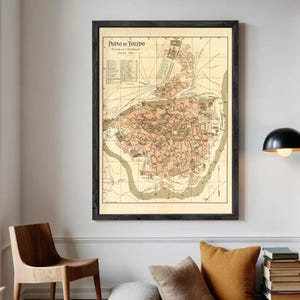 The image is a framed map of the city of Florence, Italy, depicting the city's layout and surrounding areas.