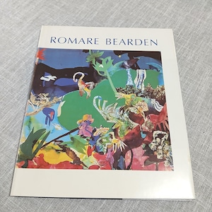 May include: A book cover featuring the name "ROMARE BEARDEN" in white text. The cover displays a colorful abstract collage with green, blue, red, and yellow elements. The artwork appears to be a vibrant and expressive composition.