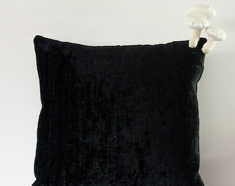 Fungimaa black pillow with white mushrooms