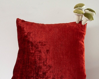 Fungimaa red pillow with green mushrooms