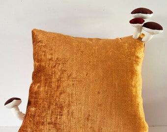 Fungimaa yellow pillow with dark red mushrooms