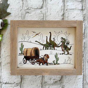 Cowboys and Dinosaurs / Wood Framed Print