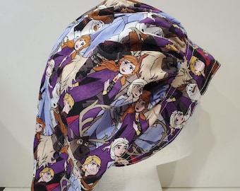 May include: A purple and blue scrub hat with a print of characters from the animated movie Frozen. The hat features images of Elsa, Anna, Kristoff, Olaf, and Sven.