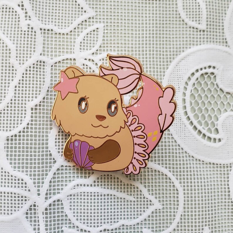 The Little Mer-Otter Enamel Pin
