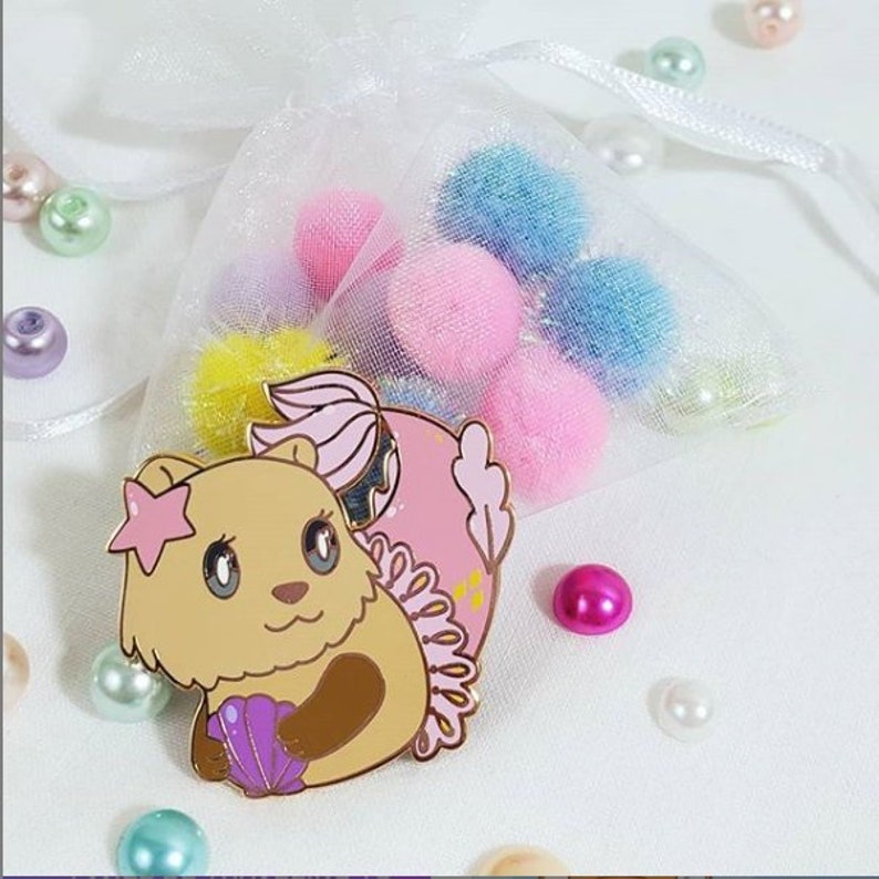 The Little Mer-Otter Enamel Pin