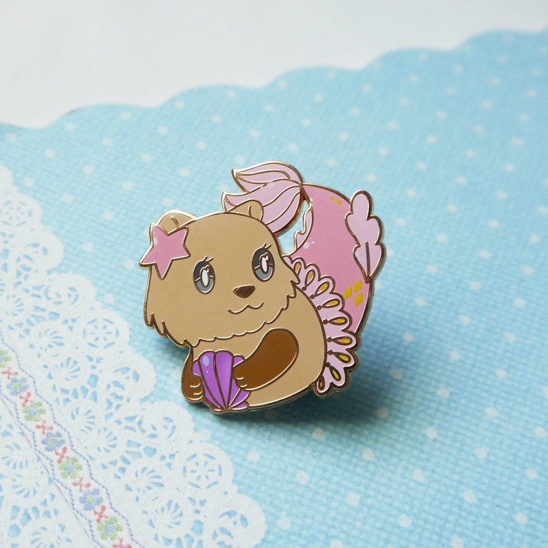 The Little Mer-Otter Enamel Pin