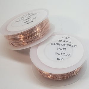 May include: Two spools of 4 ounce, 20 gauge bare copper wire. The spools are labeled "4 OZ 20 AWG BARE COPPER WIRE WIR C20 B20".