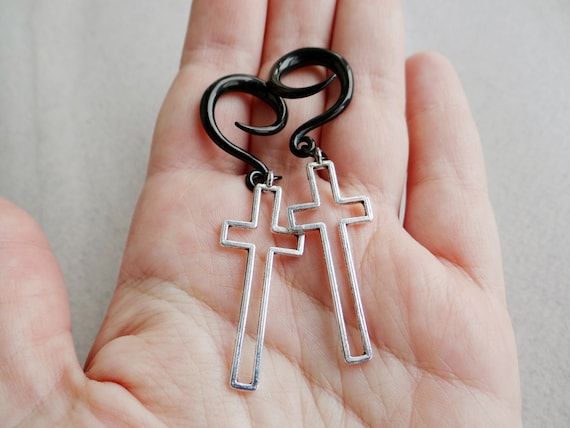 Dangle cross plugs deals