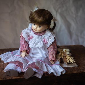 Porcelain doll with brown hair and floral dress, 1950s German Vintage, collectible antique doll