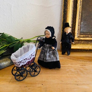 Vintage porcelain dolls with rattan pram, Amish man and woman doll, collectible retro toys
