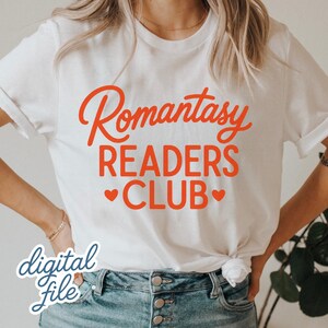 May include: White t-shirt with the text "Romantasy READERS CLUB" in orange script and block letters, with two small heart symbols. The words "digital file" are written in cursive at the bottom left.