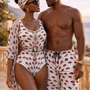May include: A couple in co-ordinating swimwear. The woman wears a white swimsuit with a brown belt and a patterned cover-up. The man wears matching swim shorts. Both are wearing sunglasses.