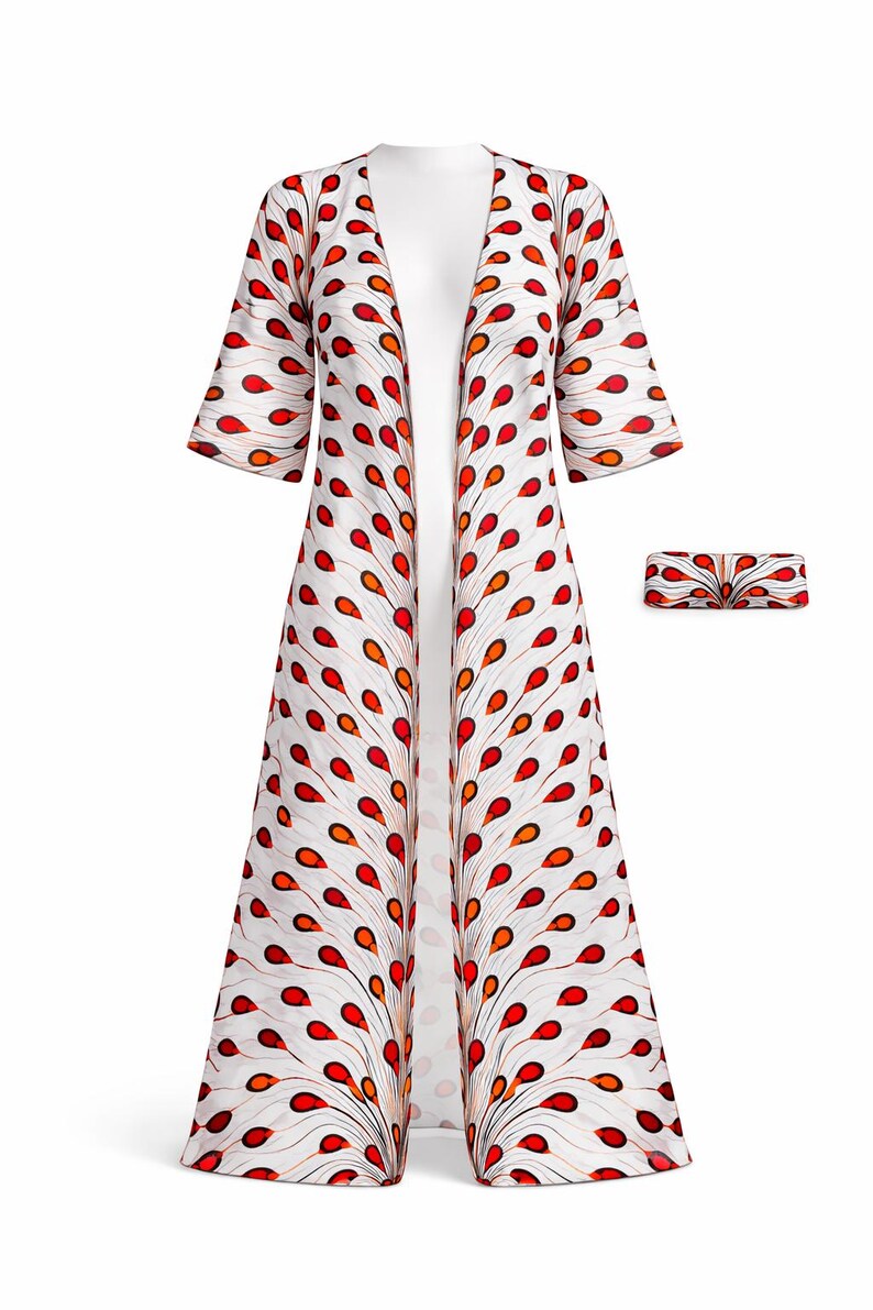 May include: A white, open-front duster coat and matching clutch with a repeating pattern of red and orange teardrop shapes. The duster has short sleeves and a floor-length design, ideal for layering.