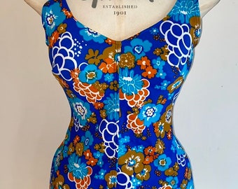 1960's mod bloemenpatroon in wit, blauw en oranje zwempak (buste 36")