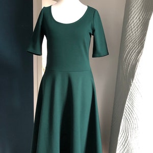 Swing dress Lotti with circle skirt made of thick romanite jersey in dark green, skater dress with round neck and short sleeves