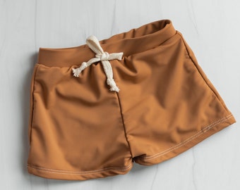 Toffee babyzwemshort: Europese stijl, mat zandkleurig