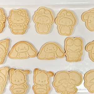 1 Dozen Plain Sugar Cookies. Friends theme. No Royal Icing. From Scratch and tasty.