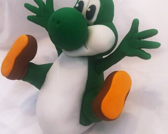 3D Yoshi jumping fondant topper. 5" tall.