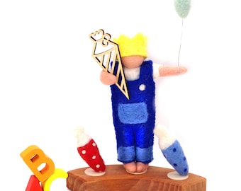 Motyw szyszki szkolnej, pierścienie roczne, prezent dla uczniów, filcowy stożek szkolny, motyw postaci dla ucznia, pierścienie Grimm's