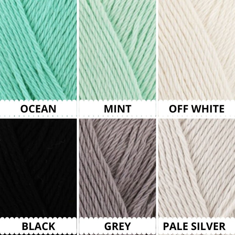 Peut inclure: Six pelotes de laine de diff&eacute;rentes couleurs&nbsp;: oc&eacute;an, menthe, blanc cass&eacute;, noir, gris et argent&eacute; p&acirc;le. La laine est dispos&eacute;e en deux rang&eacute;es de trois pelotes chacune.