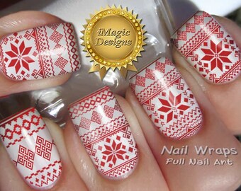Op de afbeelding: Rode en witte nagelwraps met een sneeuwvlok en geometrisch patroon. De wraps zijn ontworpen om de hele nagel te bedekken. De tekst "Nail Wraps Full Nail Art" is zichtbaar in de afbeelding.