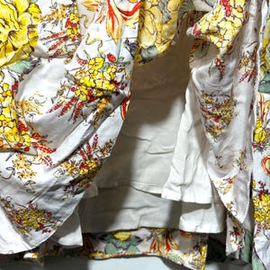 Vestido curto Free People Yara Floral em tons de marfim, com mangas esvoaçantes e modelagem fluida, tamanho M (novo com etiqueta). imagem 9