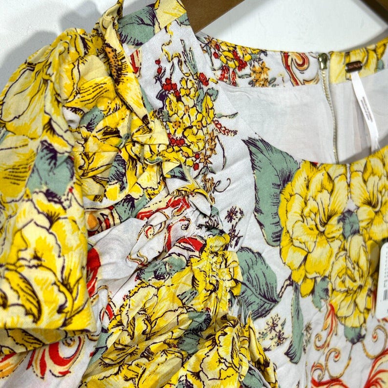 Vestido curto Free People Yara Floral em tons de marfim, com mangas esvoaçantes e modelagem fluida, tamanho M (novo com etiqueta). imagem 10