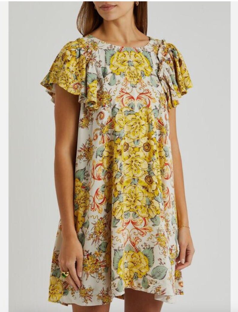 Vestido curto Free People Yara Floral em tons de marfim, com mangas esvoaçantes e modelagem fluida, tamanho M (novo com etiqueta). imagem 1