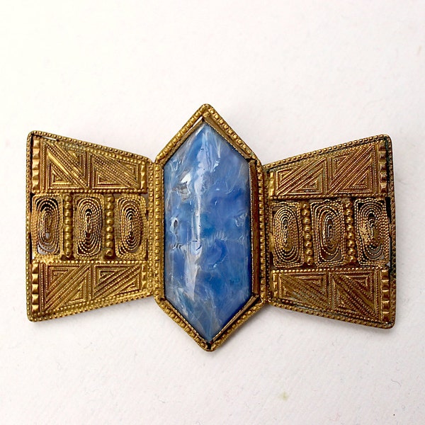 1910s Czech Bohemian large goldtone filigree brooch with a central blue molted glass made in Gablonz pre World war I