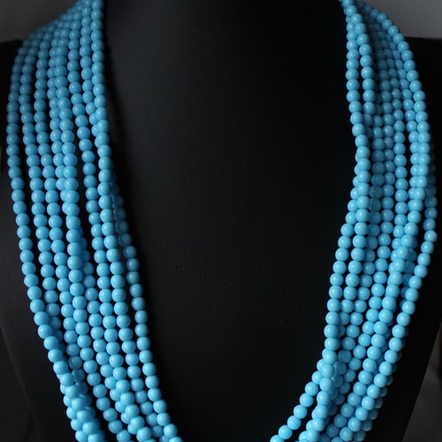 1960s Signed Austria blue glass black rhinestone shops crystal multistrand necklace and clasp adorned with faceted black crystal