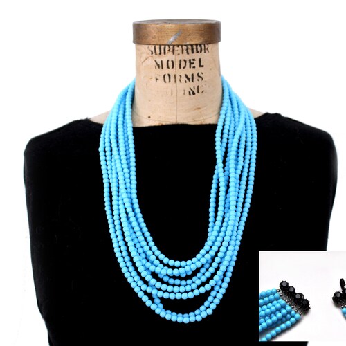 1960s Signed Austria blue glass black rhinestone shops crystal multistrand necklace and clasp adorned with faceted black crystal