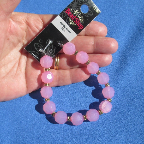 Strand of Nicole's Bead Shop Pink Acrylic Beads