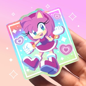 Adhesivo holográfico de vinilo resistente al agua inspirado en Amy Rose / Arte de juego de erizo con corazón rosa chibi / Rosa y morado / Estética kawaii