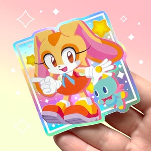 Sahne und Käse inspiriert holographischer wasserfester Vinylaufkleber | Chibi Kaninchen und Chao Spielkunst | Rosa und Lila | Kawaii Ästhetik